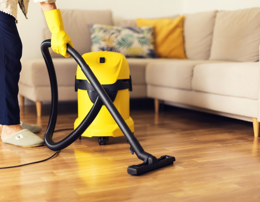 woman-cleaning-sofa-with-yellow-vacuum-cleaner-copy-space-cleaning-service-concept.jpg